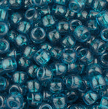 50334 カタンス ティール 透明 9x6mm(標準) バレル ポニービーズ (100個)【在庫状況：★★☆】